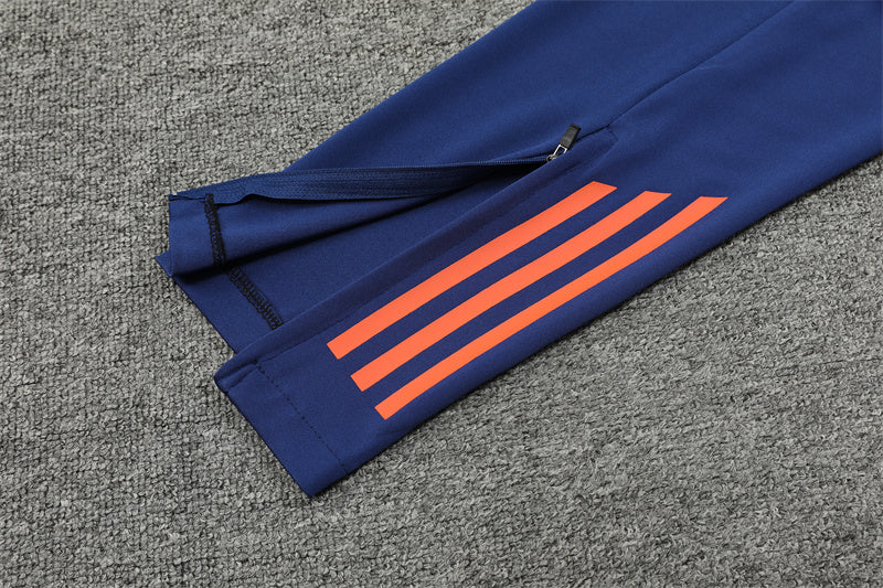 Manchester United 2024/25 Training Tracksuit (Orange)