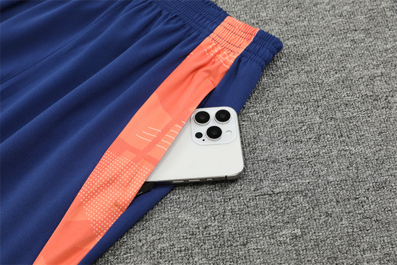 Manchester United 2024/25 Training Tracksuit (Orange)