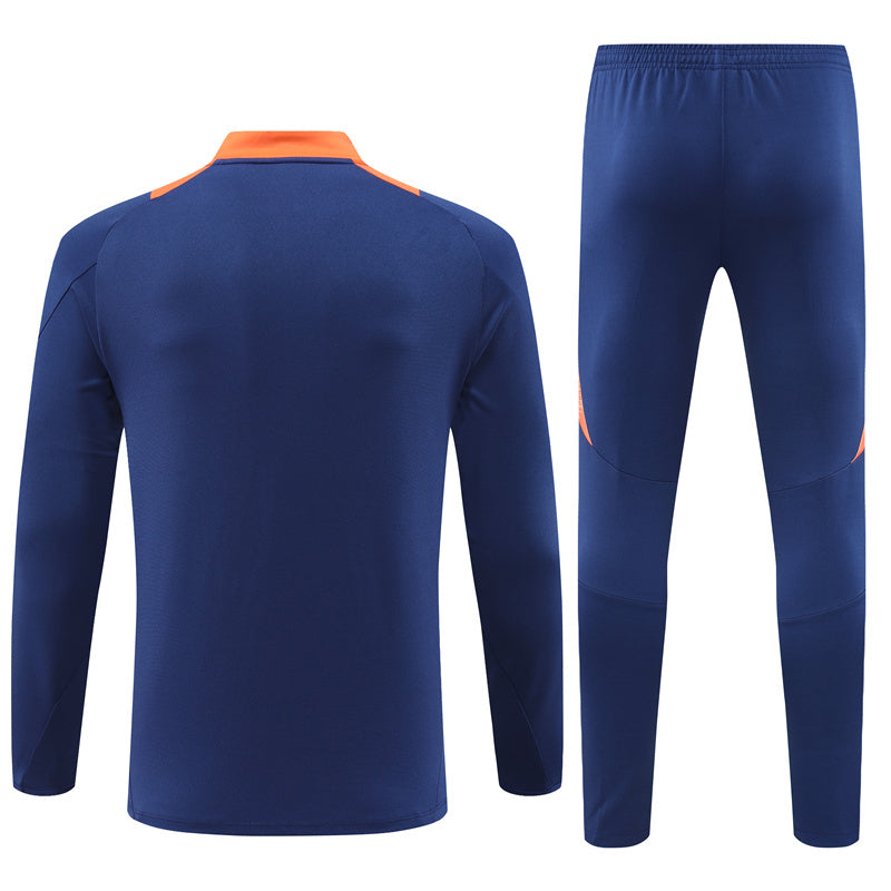 Manchester United 2024/25 Training Tracksuit (Navy and Orange)
