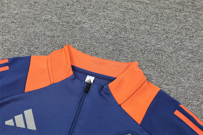 Manchester United 2024/25 Training Tracksuit (Navy and Orange)