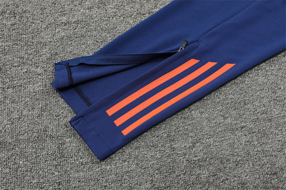 Manchester United 2024/25 Training Tracksuit (Navy and Orange)