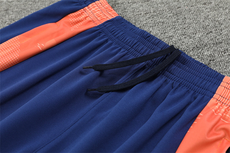 Manchester United 2024/25 Training Tracksuit (Navy and Orange)