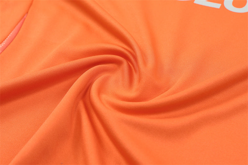 Manchester United 2024/25 Training Tracksuit (Orange)