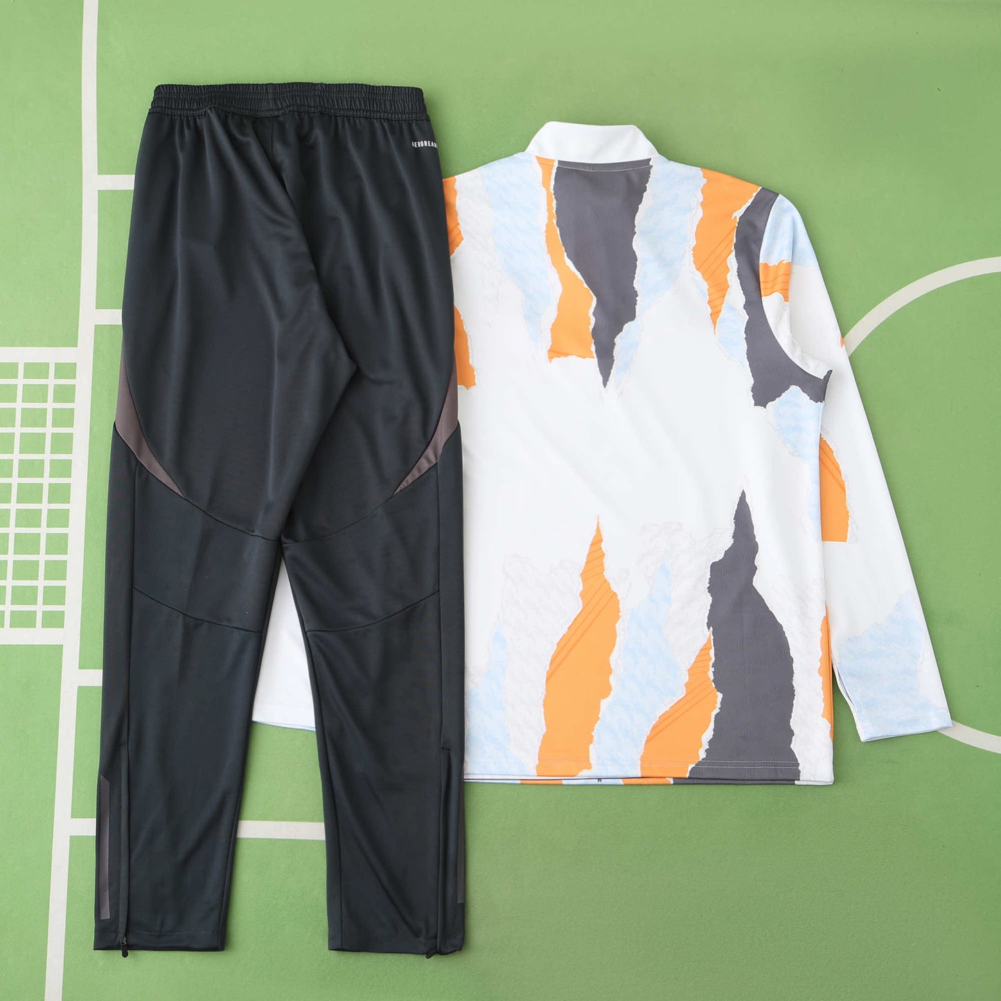 Real Madrid 2024/25 Training Tracksuit (White + Orange)